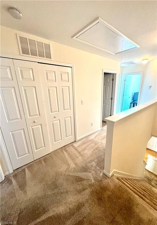 7213 Olmstead Dr, Burlington, NC 27215 - hall featuring attic access and light carpet