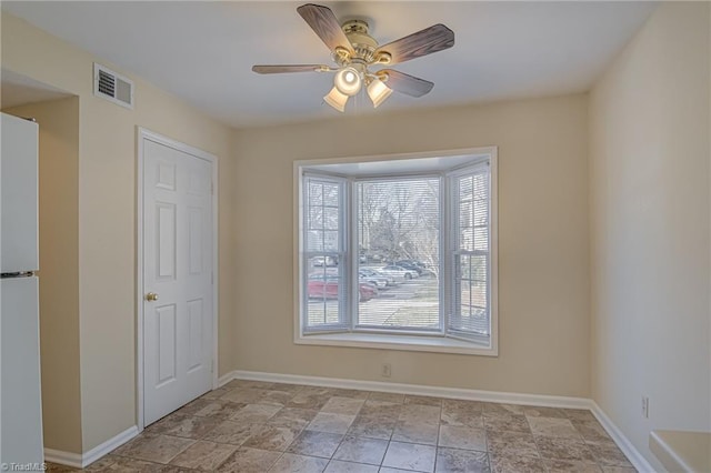 empty room with ceiling fan