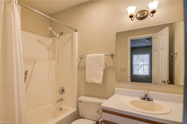 full bathroom featuring shower / bath combination with curtain, vanity, and toilet