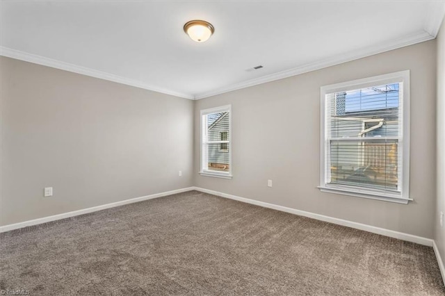 carpeted empty room with ornamental molding