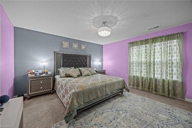 817 Sagemount St, Jamestown, NC 27282 - carpeted bedroom featuring a chandelier
