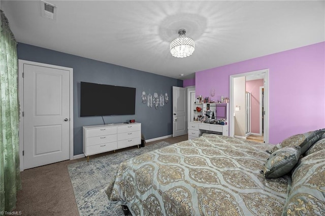817 Sagemount St, Jamestown, NC 27282 - carpeted bedroom with baseboards and a chandelier