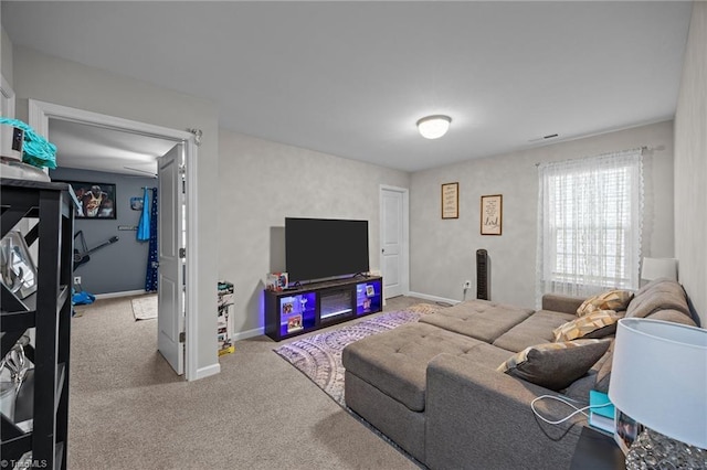 817 Sagemount St, Jamestown, NC 27282 - carpeted living room with baseboards