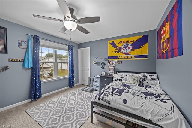 817 Sagemount St, Jamestown, NC 27282 - carpeted bedroom featuring baseboards and a ceiling fan