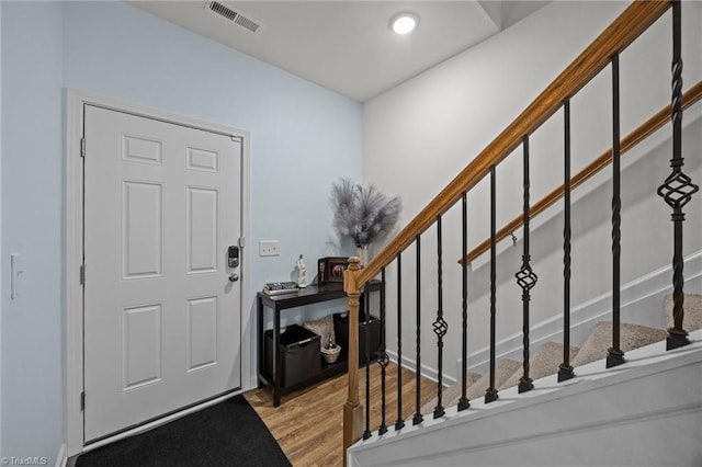 817 Sagemount St, Jamestown, NC 27282 - foyer with wood finished floors, stairway, and recessed lighting
