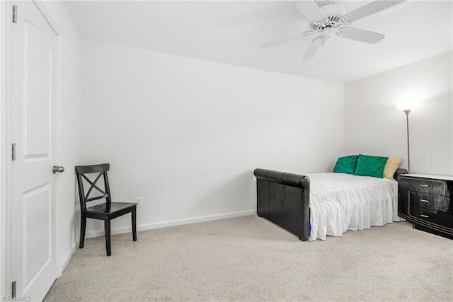 bedroom with carpet, baseboards, and ceiling fan