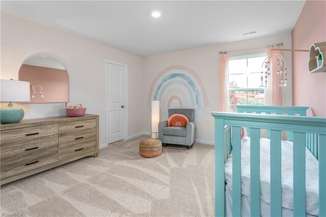 bedroom with light colored carpet