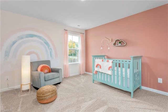 carpeted bedroom with a crib