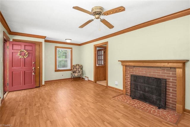 4750 Carlton Dr, Winston-Salem, NC 27105 - unfurnished living room with light wood finished floors, baseboards, ceiling fan, ornamental molding, and a fireplace
