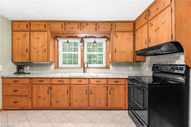 4750 Carlton Dr, Winston-Salem, NC 27105 - kitchen with electric range, under cabinet range hood, a sink, and decorative backsplash