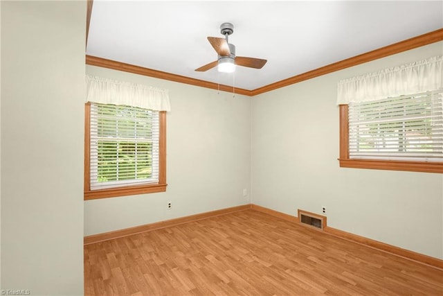 4750 Carlton Dr, Winston-Salem, NC 27105 - empty room with wood finished floors, baseboards, ornamental molding, and ceiling fan