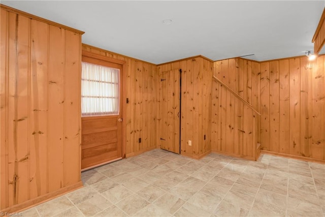 4750 Carlton Dr, Winston-Salem, NC 27105 - empty room with wooden walls and tile patterned floors