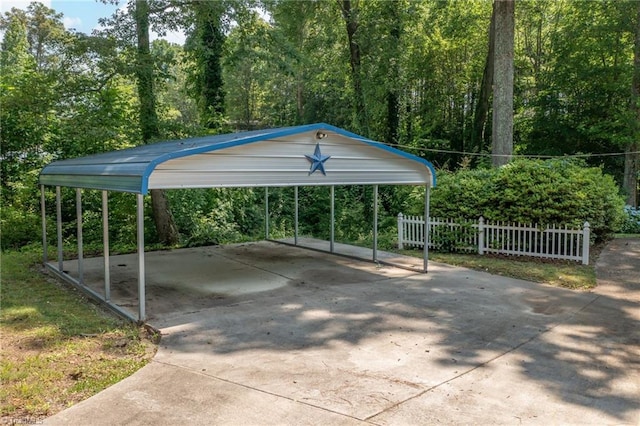 4750 Carlton Dr, Winston-Salem, NC 27105 - view of car parking with a carport and concrete driveway