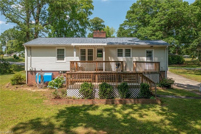 4750 Carlton Dr, Winston-Salem, NC 27105 - rear view of house featuring a yard, a chimney, and a wooden deck