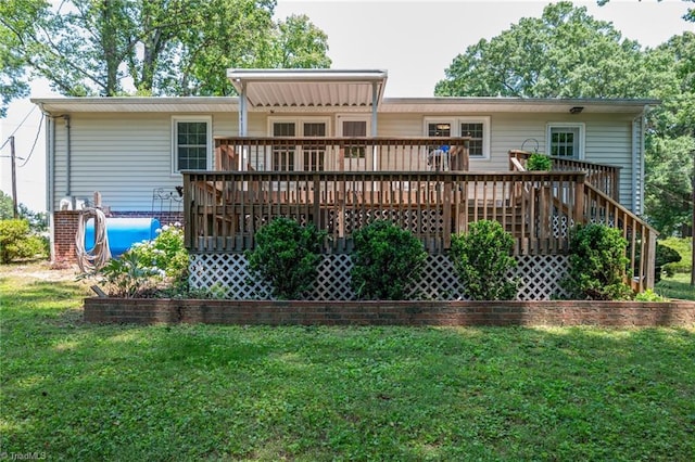 4750 Carlton Dr, Winston-Salem, NC 27105 - rear view of property featuring a yard and a wooden deck