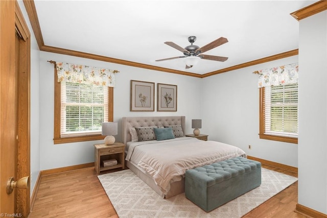 4750 Carlton Dr, Winston-Salem, NC 27105 - bedroom featuring multiple windows, ornamental molding, baseboards, light wood-style flooring, and ceiling fan