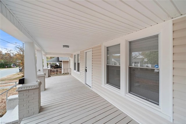 deck with covered porch