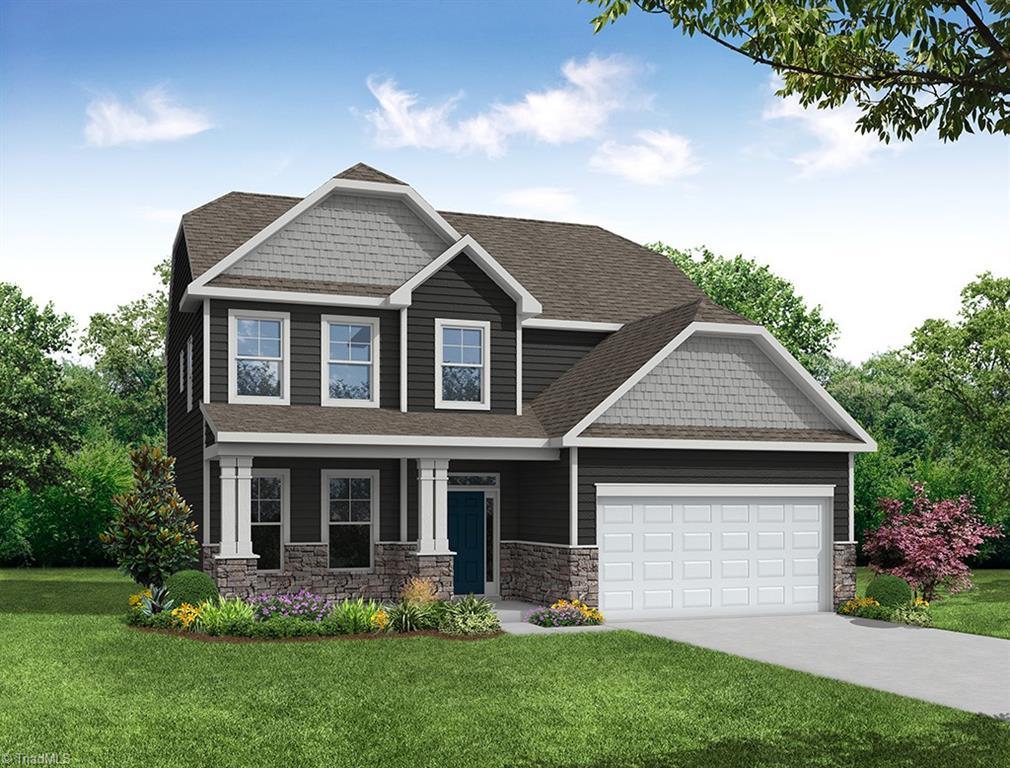 5644 Siler St, Trinity, NC 27370 - craftsman-style home featuring stone siding, a garage, and a front lawn