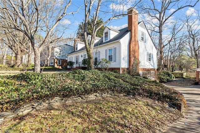 view of front of house with a chimney