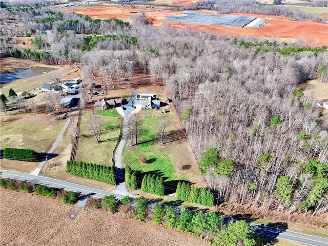 birds eye view of property with a rural view