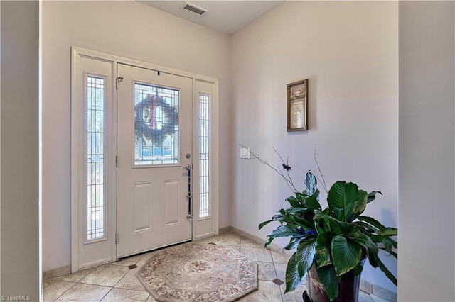 view of tiled foyer entrance