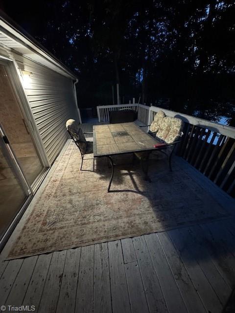 179 Abington Ln, Troutman, NC 28166 - wooden deck with outdoor dining area