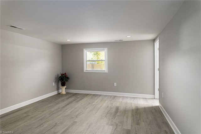 empty room featuring light hardwood / wood-style floors