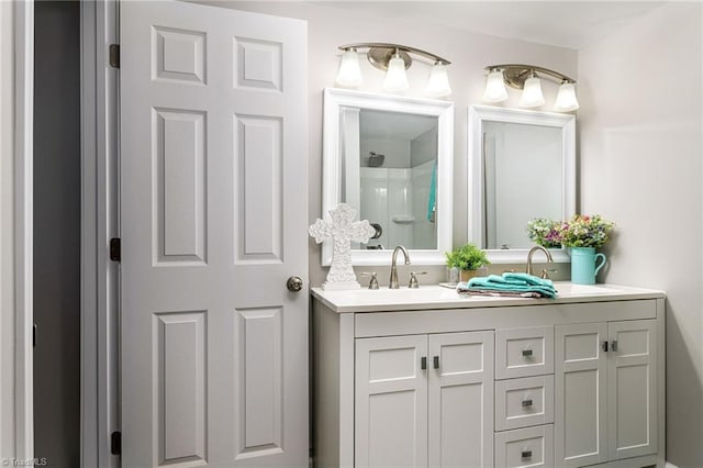 bathroom featuring vanity and walk in shower