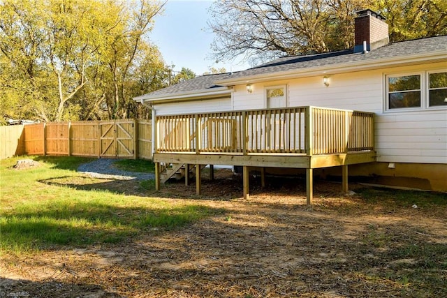 back of property featuring a wooden deck