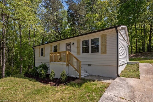 120 King Charles Rd, Hillsborough, NC 27278 - view of front of property with crawl space and a front lawn