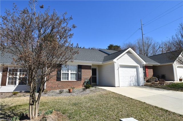 ranch-style house featuring an attached garage, brick siding, concrete driveway, roof with shingles, and a front lawn