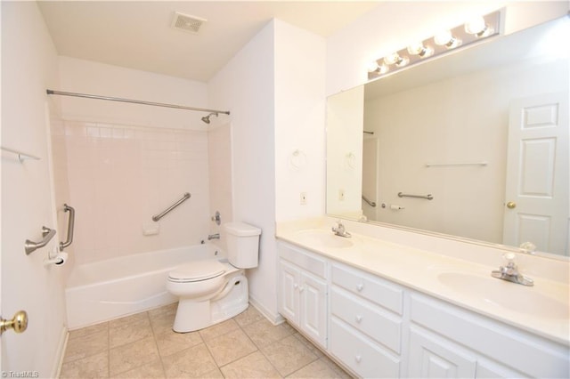 full bathroom featuring toilet, double vanity, visible vents, and a sink