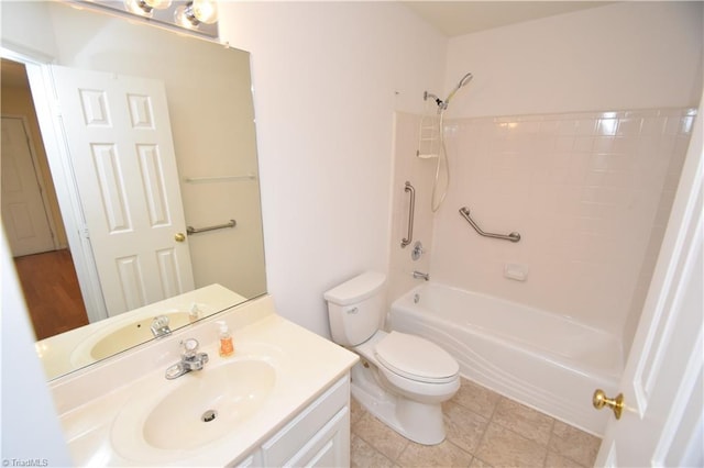 bathroom with toilet, shower / tub combination, and vanity