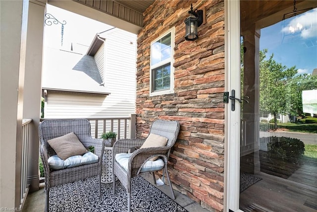 balcony featuring covered porch