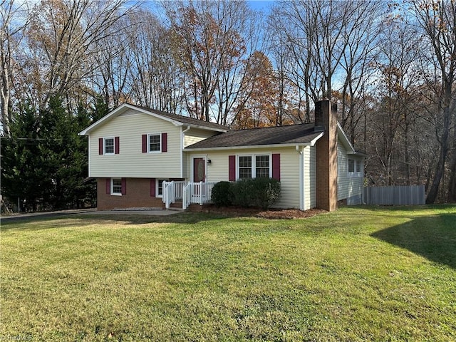 split level home with a front yard