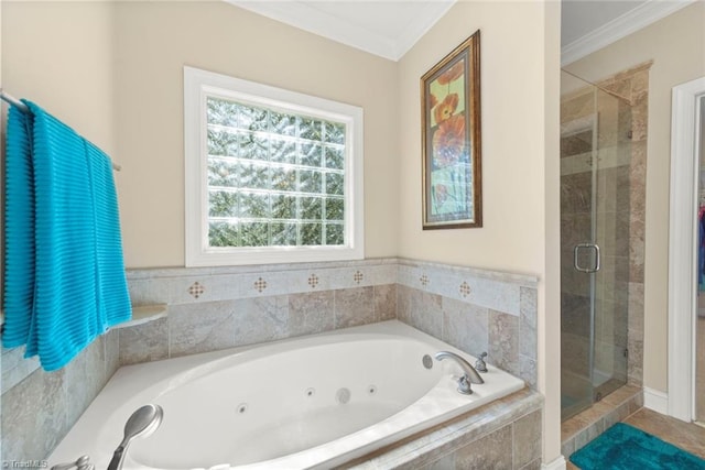 bathroom with crown molding and independent shower and bath