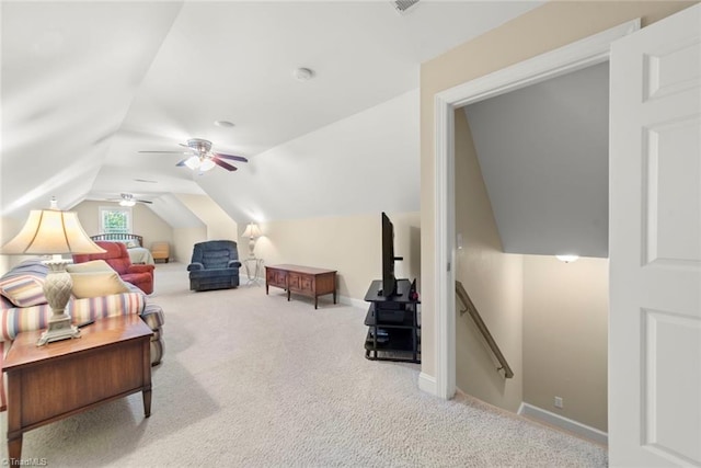 carpeted bedroom featuring lofted ceiling and ceiling fan