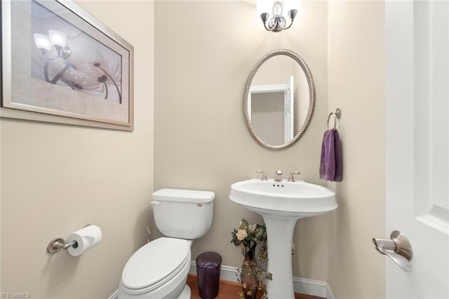 bathroom featuring toilet