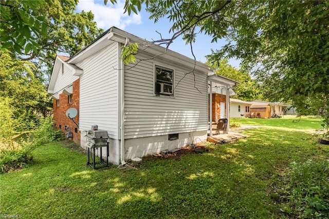904 Ashe St, Greensboro, NC 27406 - view of side of property with a yard and crawl space
