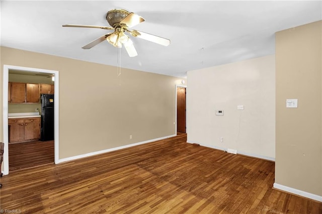 904 Ashe St, Greensboro, NC 27406 - unfurnished room with wood finished floors and a ceiling fan