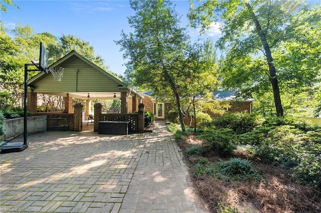 1603 Ilchester Ct, Greensboro, NC 27408 - view of front of property featuring brick siding and a patio area