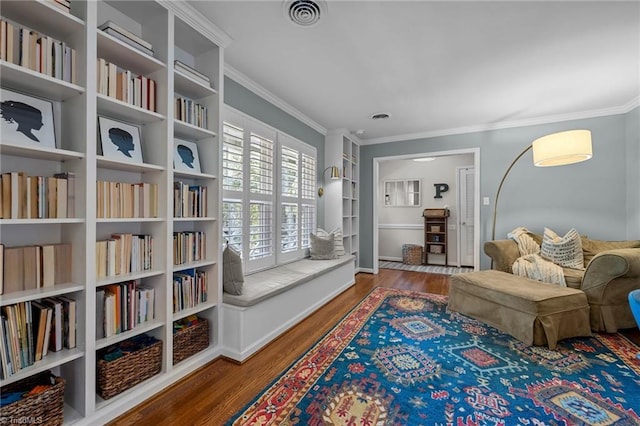 1603 Ilchester Ct, Greensboro, NC 27408 - sitting room with wood finished floors and ornamental molding