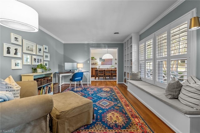 1603 Ilchester Ct, Greensboro, NC 27408 - living area with wood finished floors, ornamental molding, and an office area