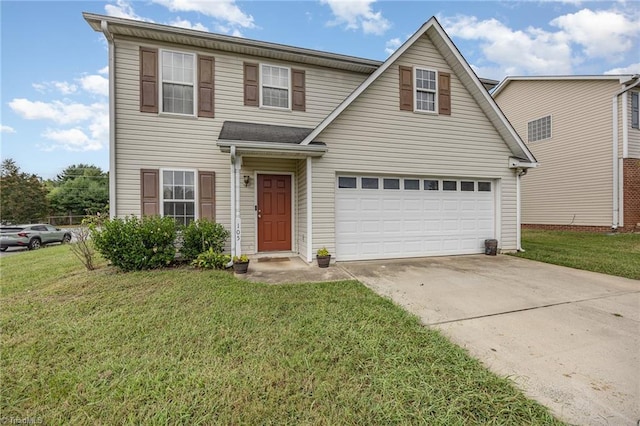 view of front of house with a garage and a front lawn