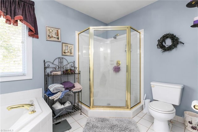 bathroom with shower with separate bathtub, toilet, and tile patterned flooring