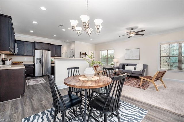 914 Bonanza Ln, Mebane, NC 27302 - dining room with baseboards, recessed lighting, ornamental molding, dark wood-type flooring, and ceiling fan with notable chandelier