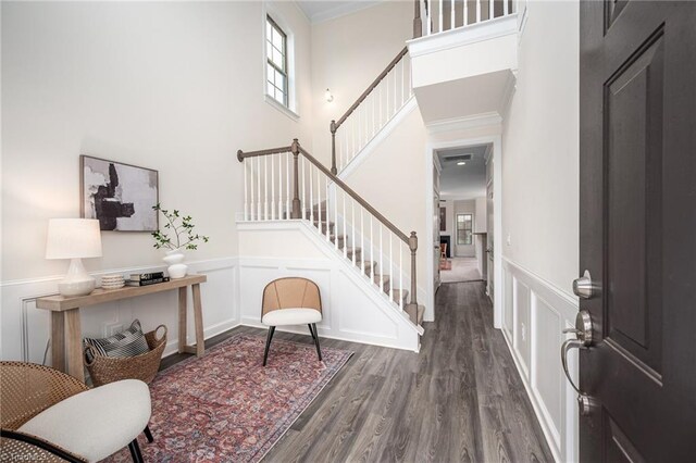 914 Bonanza Ln, Mebane, NC 27302 - entryway with stairway, a decorative wall, a towering ceiling, and wood finished floors