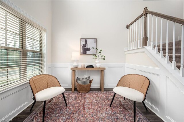 914 Bonanza Ln, Mebane, NC 27302 - sitting room with a decorative wall, wood finished floors, and wainscoting