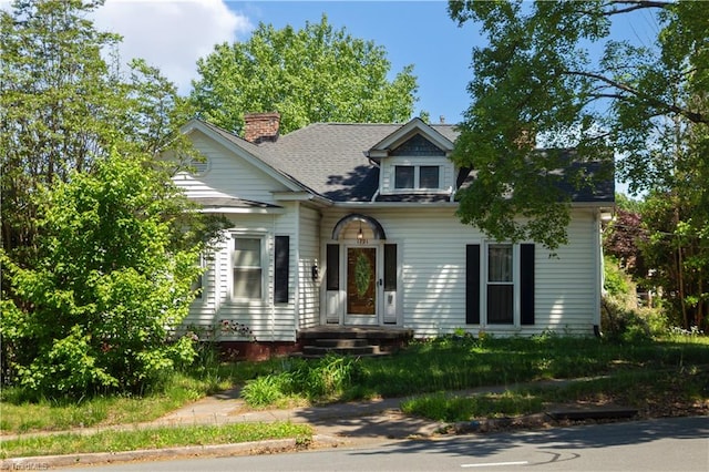 view of front of property with a chimney