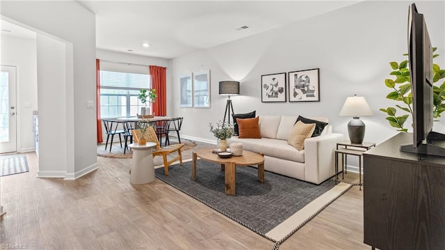 living room featuring light wood-type flooring